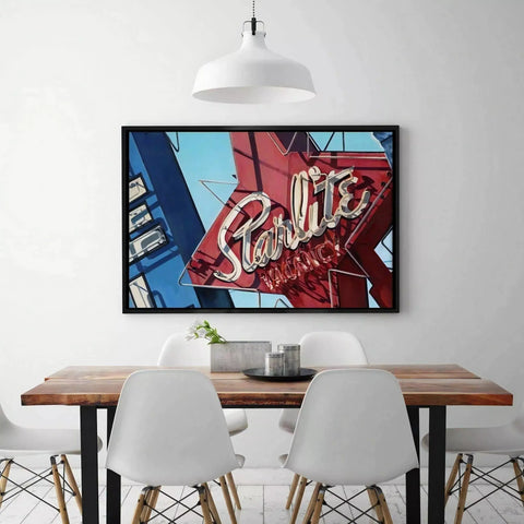Framed vintage-style neon sign artwork featuring ’Starlite’ in red and blue colors.