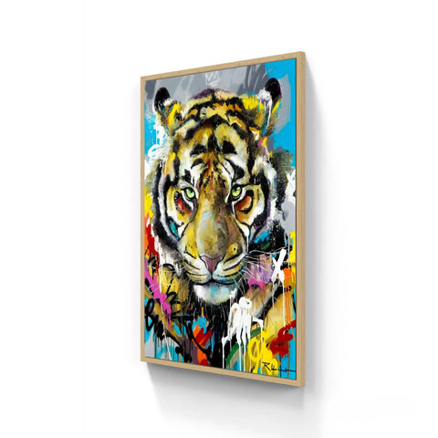 A framed, colorful, abstract-style painting of a tiger’s head.