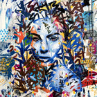 A painting of a woman’s face with colorful paint splats