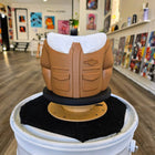 Decorative figure resembling a torso wearing a tan military-style jacket with a white collar.