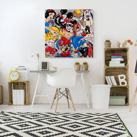 A white desk with a black and white rug and a large painting of cartoon characters