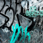 A wall with graffiti writing on it