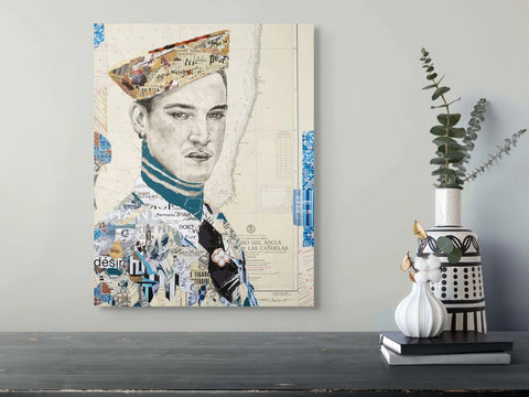 Collage portrait canvas featuring a man in a beret and turtleneck, composed of layered newspaper clippings and map fragments with blue accents on an off-white background.