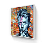 Street art portrait with a ’shh’ gesture against a vibrant graffiti background.