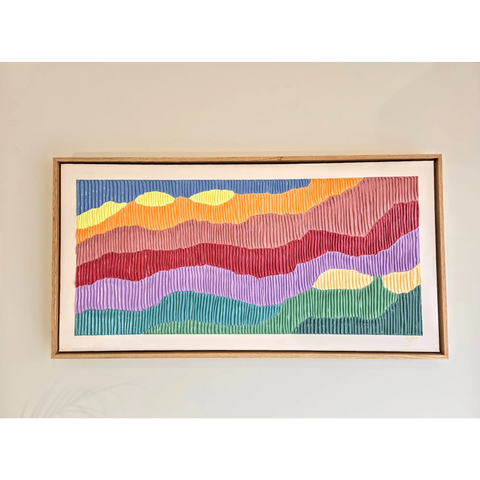 Colorful abstract painting with wavy horizontal stripes in a wooden frame.