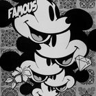 Mickey mouse with a bow and a bow tie on his head