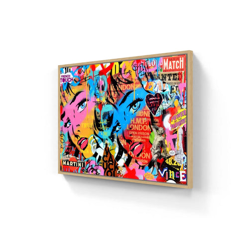 Colorful graffiti-style pop art canvas featuring vibrant eyes, text, and abstract designs.