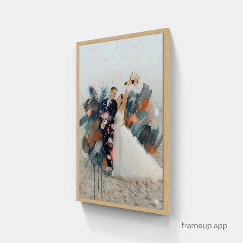 A framed wedding portrait featuring a bride and groom in an abstract watercolor style with splashes of teal, orange, and black against a light background.