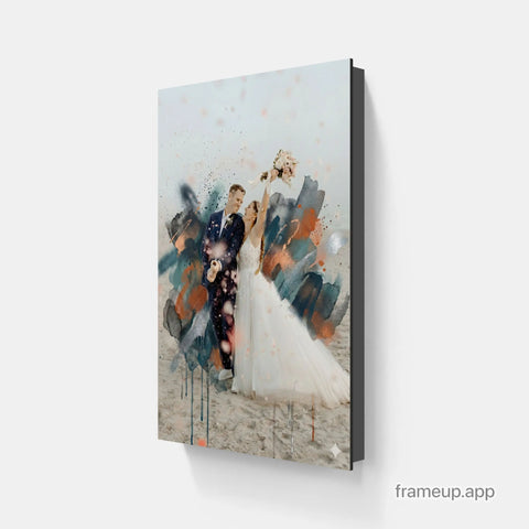A modern canvas print featuring a couple in wedding attire, with the bride holding her bouquet and abstract paint splatters in teal, orange, and black overlaying their image.