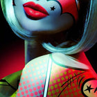 A woman with a clown makeup and green hair