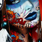 A woman with a colorful face paint and feathers