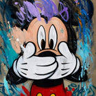 Mickey mouse painting on a wall with graffiti on it