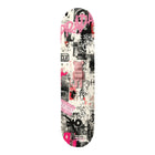 A pink bearbrick figure with ’prada’ printed on its chest sits centrally on a skateboard deck covered in black, white, and vibrant pink graffiti-style graphics.