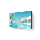 Modern rectangular aluminium wall art featuring a turquoise infinity pool scene with white architecture and tropical foliage