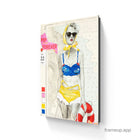 A vibrant pop art calendar featuring a woman in a blue and yellow bikini with sunglasses in limited edition aluminium
