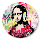 A button with a painting of a woman’s face