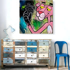 A distressed wooden dresser with multiple colorful drawers.