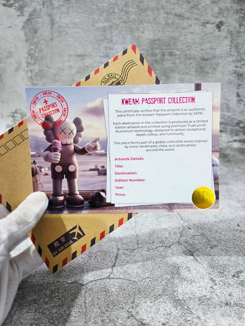 Gray kaws-style aluminum figurine holding ice cream cone with white circular accents from morocco kweam artwork