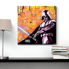 Pop art style painting of Darth Vader against a vibrant orange background.