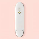 White electronic device resembling a sleek, elongated remote control with a small circular button.