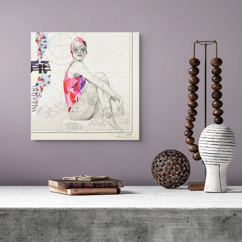 A vibrant, abstractly illustrated canvas print featuring a swimmer in a colorful swimsuit against a vintage map background.