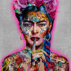 A woman with tattoos and flowers on her head